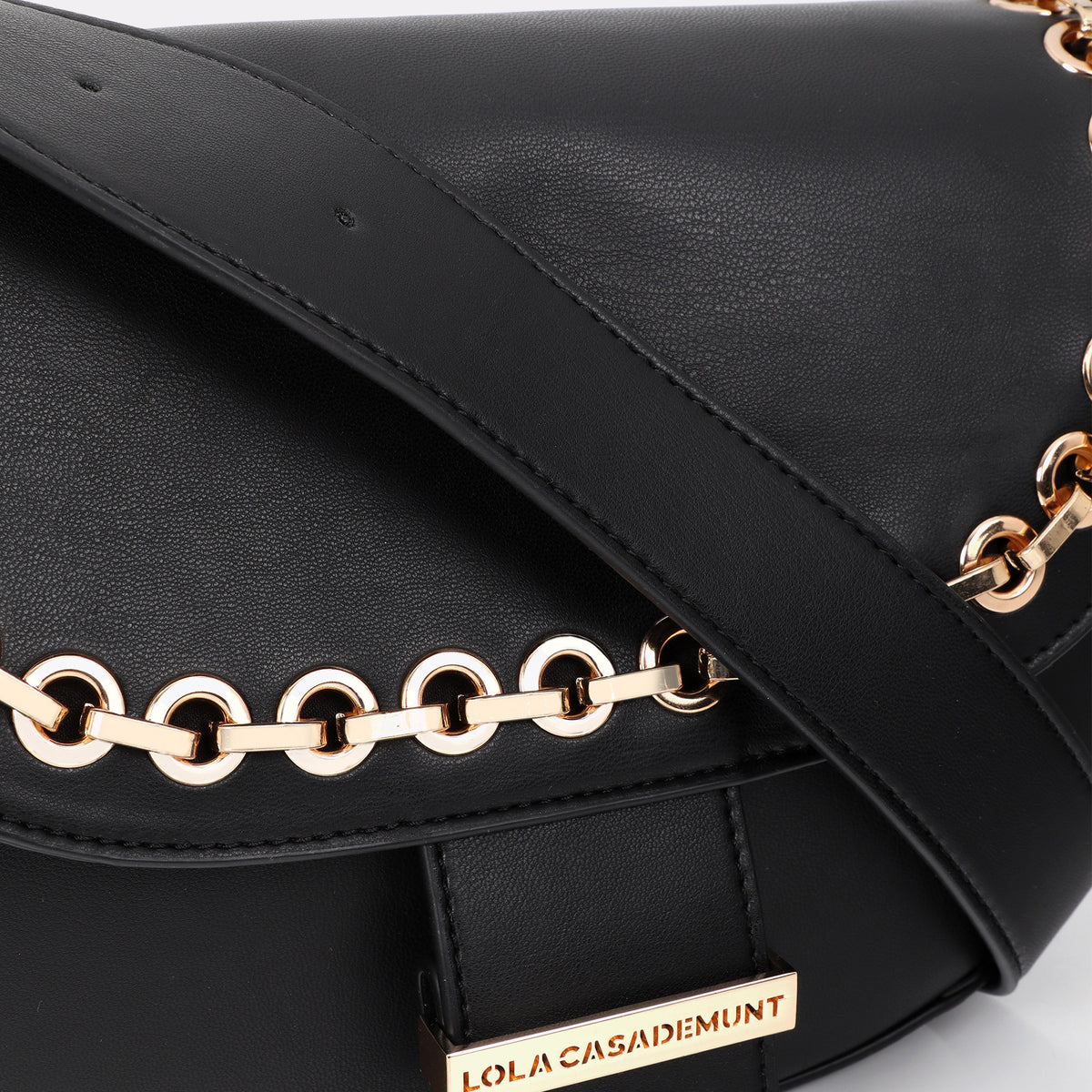 Flap crossbody bag with eyelets