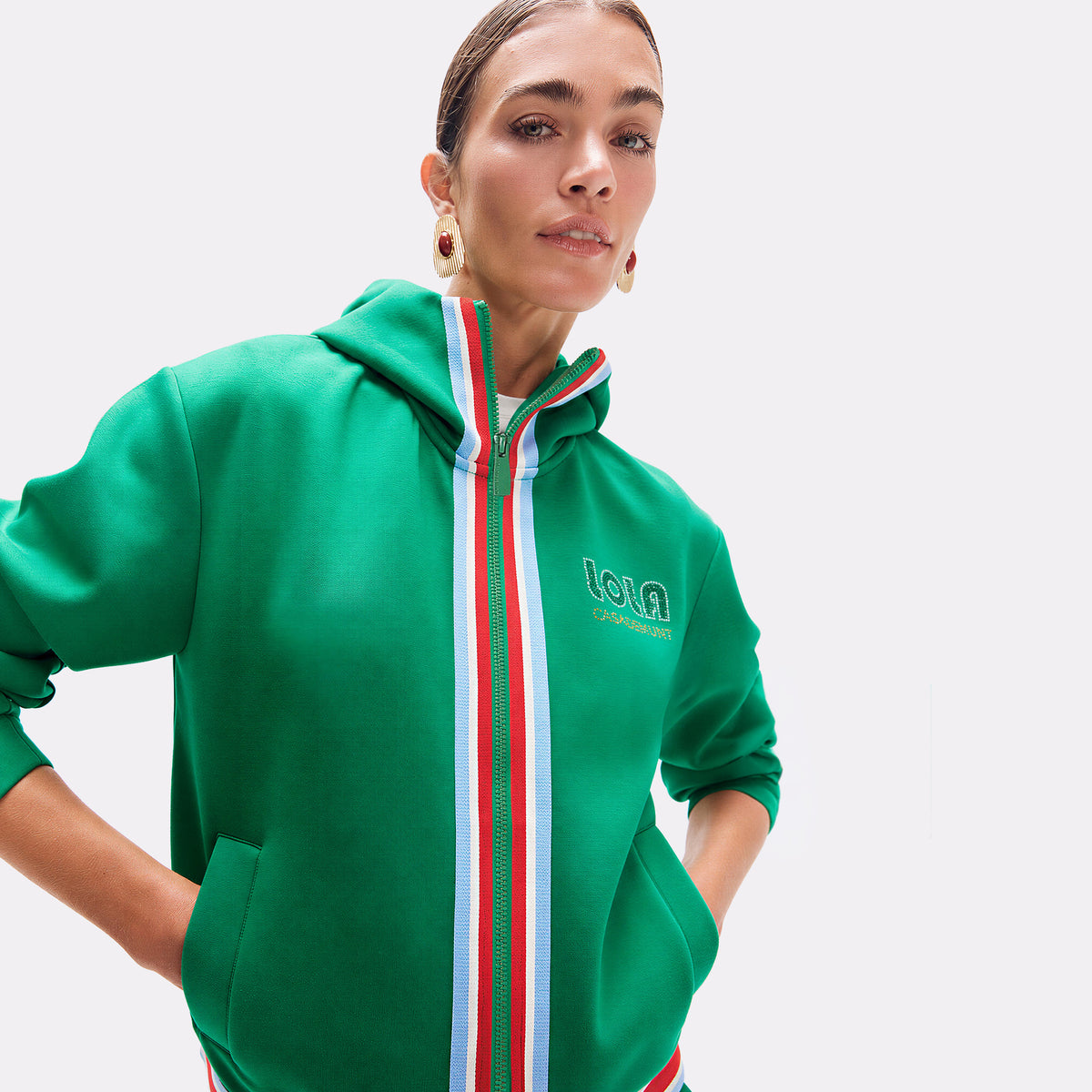 Sudadera verde con detalles tricolor