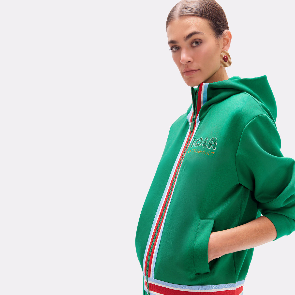 Sudadera verde con detalles tricolor