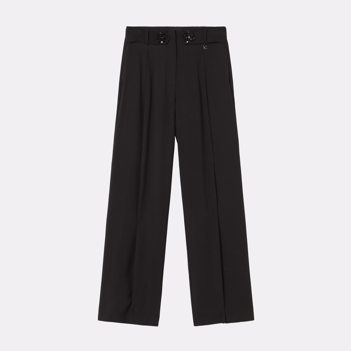 Pantalón palazzo con detalle flor
