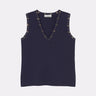 Top con borchie rotonde e quadrate